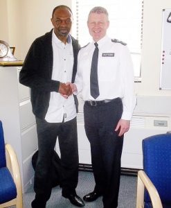 James Cook MBE with the Borough Commander of Hackney.
