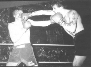Tony Rabbetts landing a right cross on Dave Harrison at the Lyceum Ballroom in February 1983.